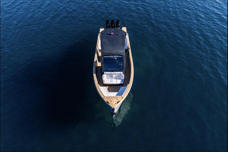 Slide: The Image of Aerial view of 2025 Maxim Yachts MAX44R on calm blue water. - 6