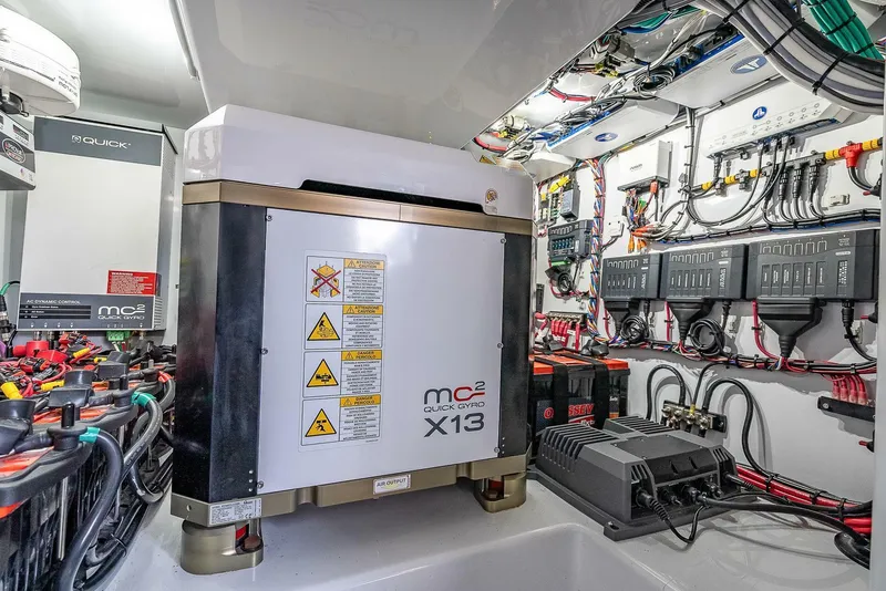 Slide: The Image of Engine room of 2024 Yellowfin 54 Offshore boat with advanced electrical systems and equipment. - 12