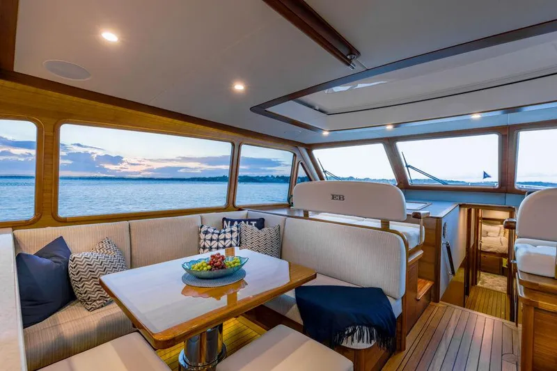 Slide: The Image of Luxurious interior of 2026 Eastbay EB60 yacht with elegant seating and ocean view. - 17
