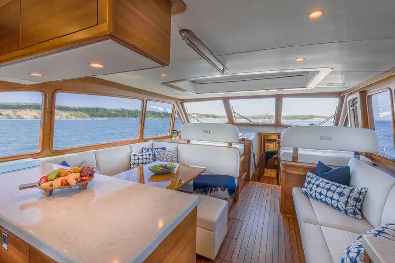 Slide: The Image of Luxurious interior of 2026 Eastbay EB60 yacht with elegant seating and scenic views. - 22