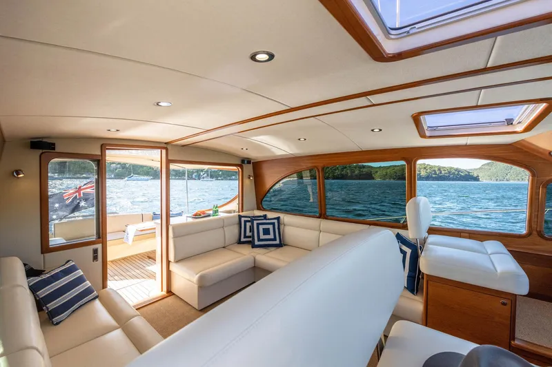 Slide: The Image of Luxurious interior of 2026 Palm Beach Motor Yachts PB45 with elegant seating and scenic views. - 16