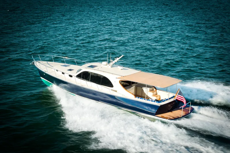 Slide: The Image of 2026 Palm Beach Motor Yachts PB50 cruising on open water, showcasing sleek design and luxury. - 5