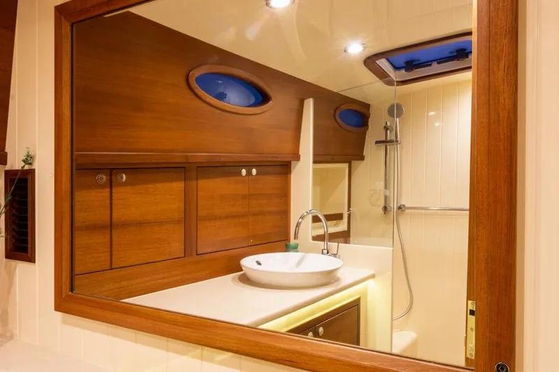 Slide: The Image of Luxurious bathroom interior of 2026 Palm Beach Motor Yachts PB50, featuring elegant wood finishes. - 9