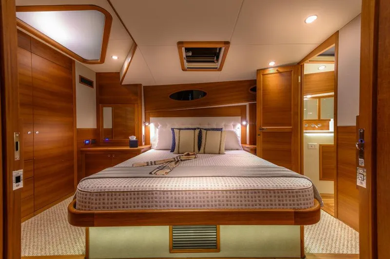 Slide: The Image of Luxurious cabin interior of 2026 Palm Beach Motor Yachts PB50, featuring elegant wood finishes. - 18