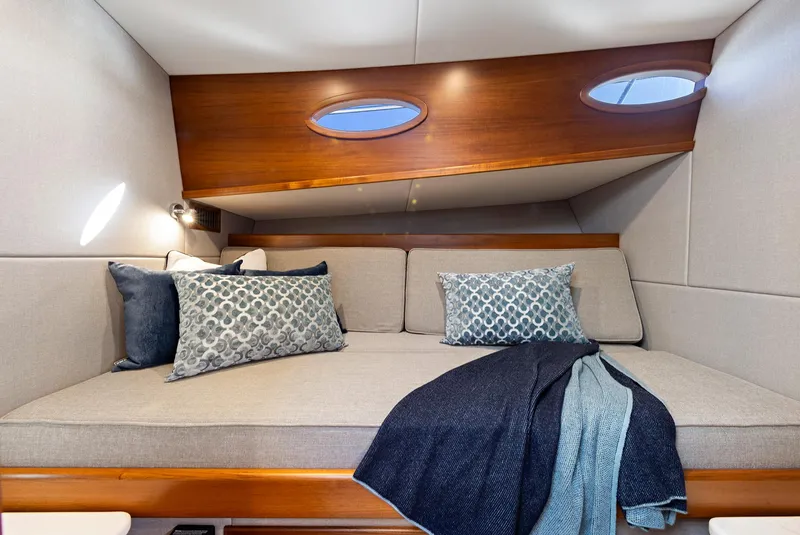 Slide: The Image of Luxurious cabin interior of 2026 Palm Beach Motor Yachts PB50 with elegant bedding. - 22