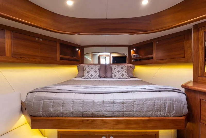 Slide: The Image of Luxurious cabin interior of 2026 Palm Beach Motor Yachts PB50 with elegant wood finish. - 8