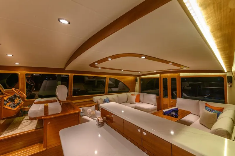 Slide: The Image of Luxurious interior of 2026 Palm Beach Motor Yachts PB50 with elegant wood finishes. - 19