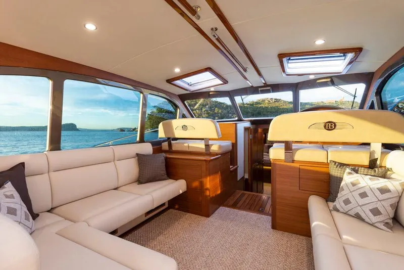 Slide: The Image of Luxurious interior of 2026 Palm Beach Motor Yachts PB50 with elegant seating and scenic views. - 7