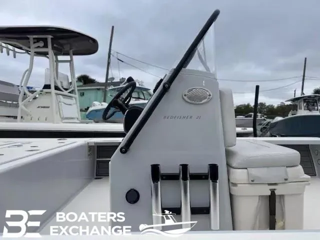 Slide: The Image of 2021 Hewes 21 REDFISHER boat interior with steering console at Boaters Exchange. - 5