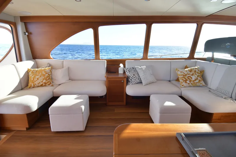 Slide: The Image of Luxurious interior of 2026 Palm Beach Motor Yachts PB70 with ocean view. - 12