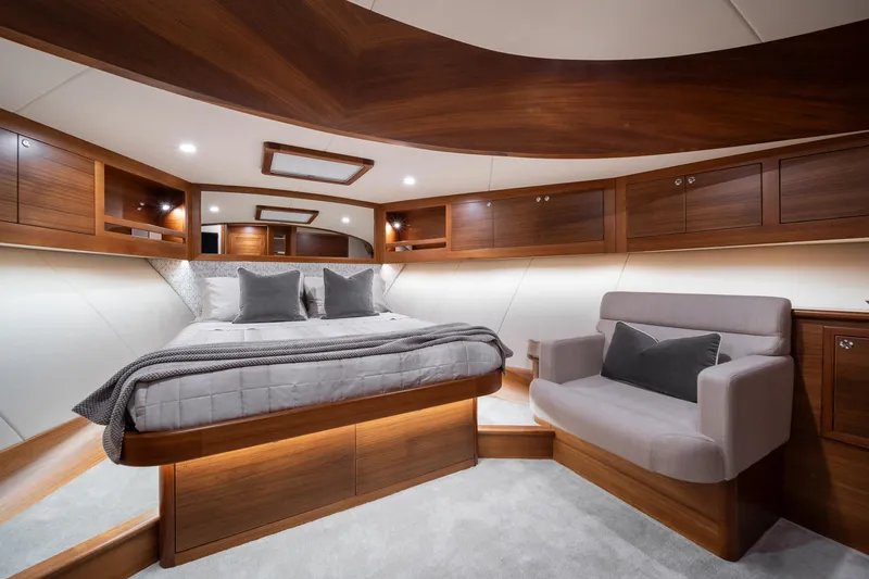 Slide: The Image of Luxurious 2026 Palm Beach Motor Yachts PB70 cabin with elegant wood finishes and modern design. - 11