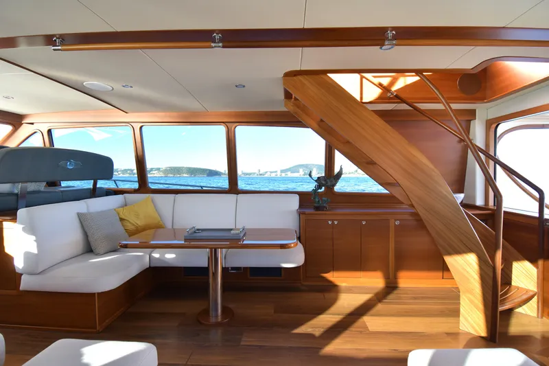 Slide: The Image of Luxurious interior of 2026 Palm Beach Motor Yachts PB70 with elegant wood finishes. - 13