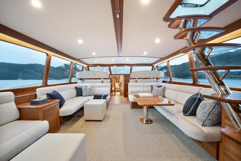Slide: The Image of Luxurious interior of 2026 Palm Beach Motor Yachts PB70 with elegant seating and panoramic windows. - 19