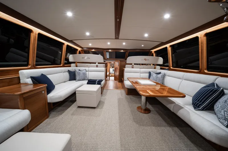 Slide: The Image of Luxurious interior of 2026 Palm Beach Motor Yachts PB70 with elegant seating and wooden accents. - 20