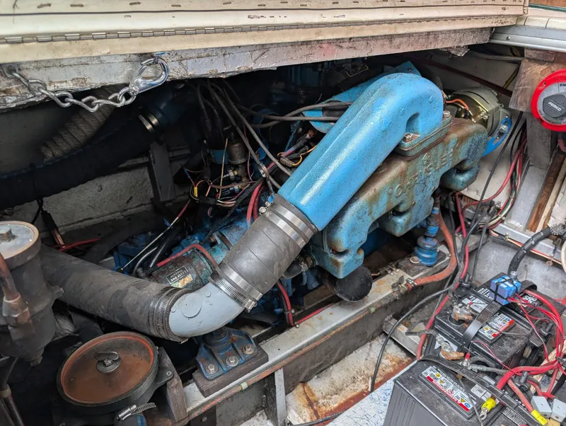 Slide: The Image of Engine compartment of a 1989 Marinette 28 Sport Fish Fly Bridge boat. - 24