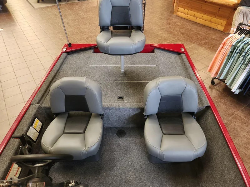 Slide: The Image of 2025 Tracker Bass Tracker Classic XL boat interior with three gray seats. - 2