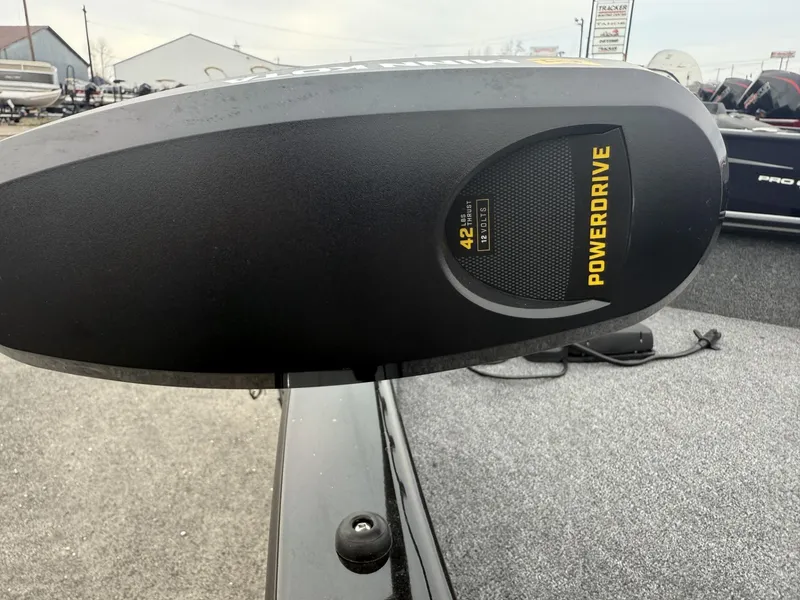 Slide: The Image of 2025 Tracker Pro Guide V-16 SC boat with PowerDrive motor, close-up view. - 7