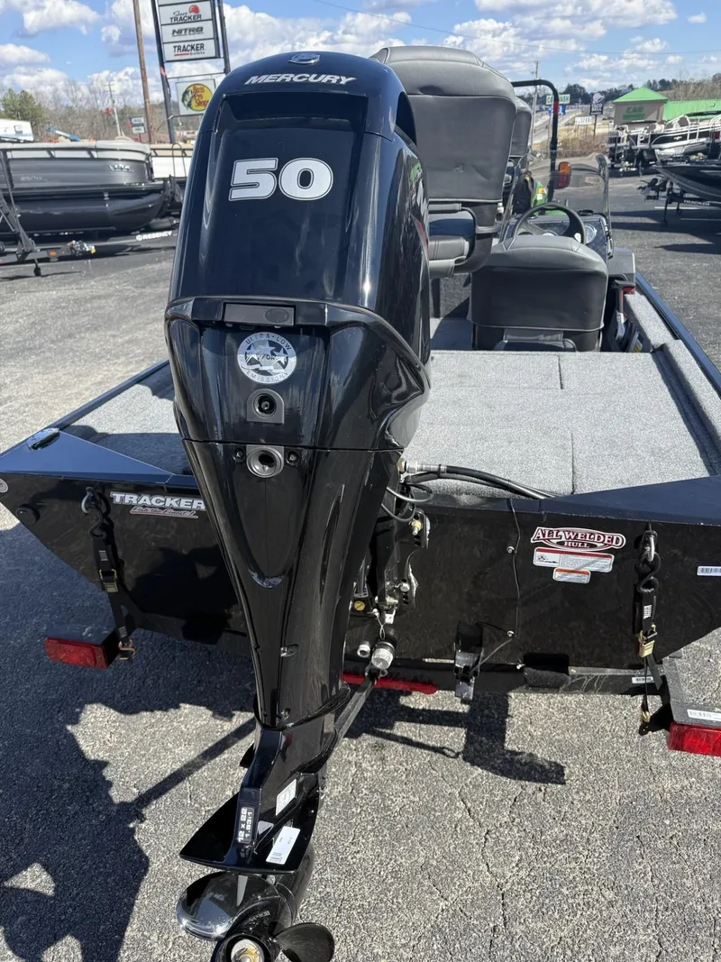 Slide: The Image of 2025 Tracker Bass Tracker Classic XL with Mercury 50 outboard motor, rear view. - 3