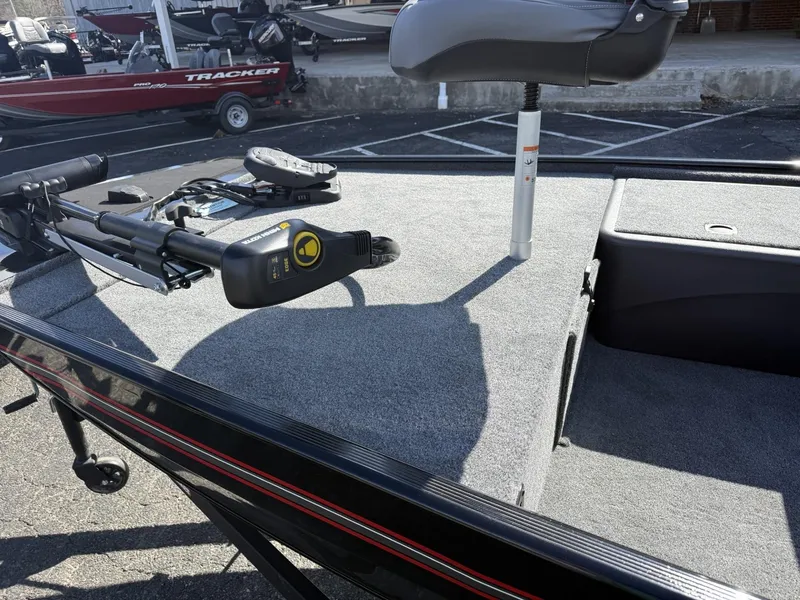 Slide: The Image of 2025 Tracker Bass Tracker Classic XL boat deck with seat and trolling motor. - 7