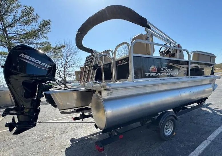 Slide: The Image of 2025 Sun Tracker Party Barge 16 DLX pontoon boat with Mercury outboard motor. - 5