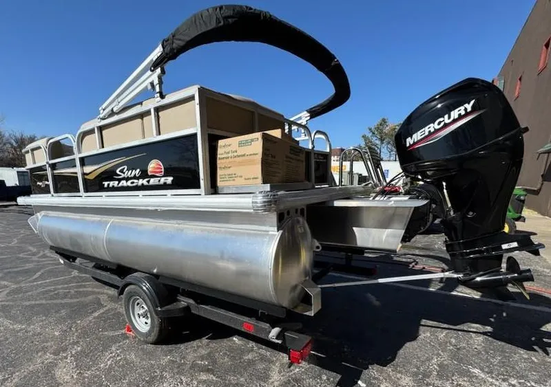Slide: The Image of 2025 Sun Tracker Party Barge 16 DLX pontoon boat with Mercury outboard motor. - 6
