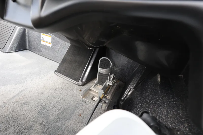 Slide: The Image of Foot pedal area of 2022 Nitro Z20 Pro boat interior. - 23