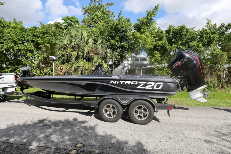 Slide: The Image of 2022 Nitro Z20 Pro boat on trailer, parked on a sunny day. - 5