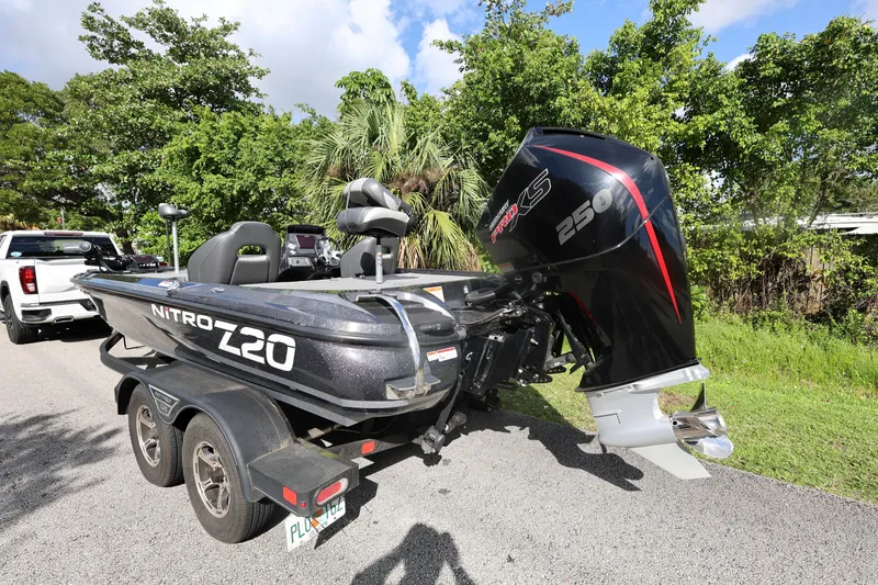 Slide: The Image of 2022 Nitro Z20 Pro boat with powerful outboard motor on a trailer. - 6