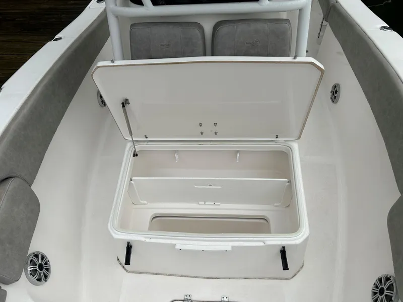 Slide: The Image of 2018 Sea Fox 266 Commander boat with open storage compartment on deck. - 13
