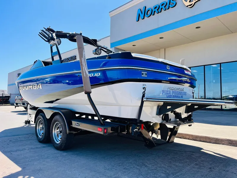 Slide: The Image of 2012 Moomba Mojo 2.5 boat on trailer outside dealership. - 7
