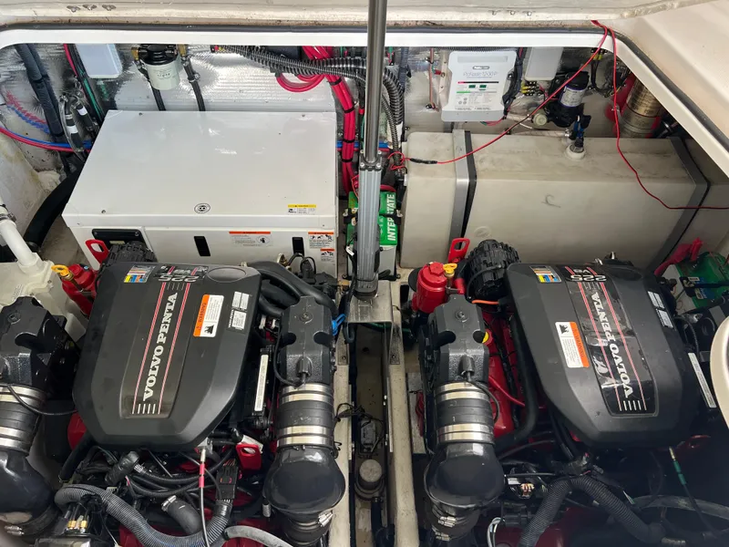 Slide: The Image of Engine compartment of a 2013 Regal 30 Express boat with dual Volvo Penta engines. - 37