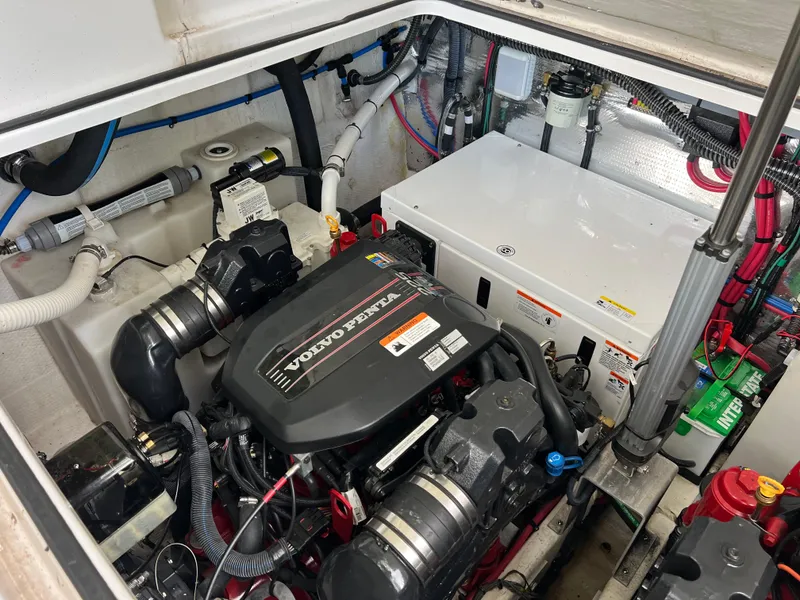 Slide: The Image of Engine compartment of a 2013 Regal 30 Express boat with Volvo Penta engine. - 38