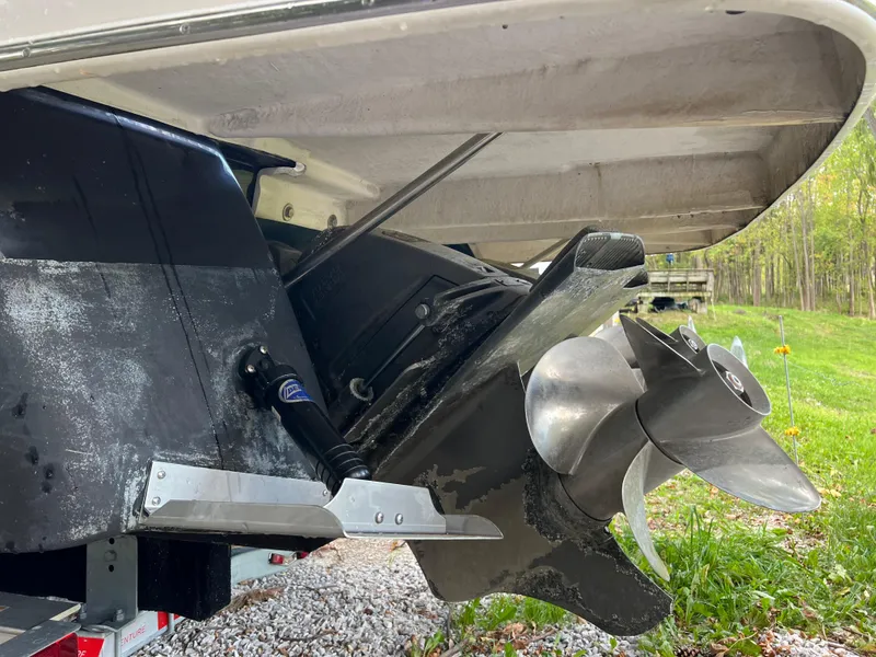 Slide: The Image of Propeller and stern of a 2013 Regal 30 Express boat on a trailer. - 4