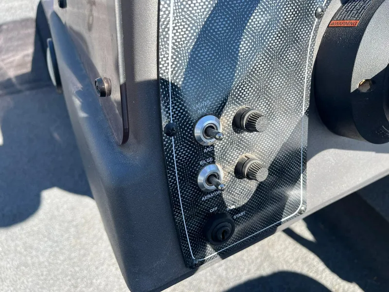 Slide: The Image of Control panel of a 2020 Tracker Bass Tracker Classic XL boat. - 15