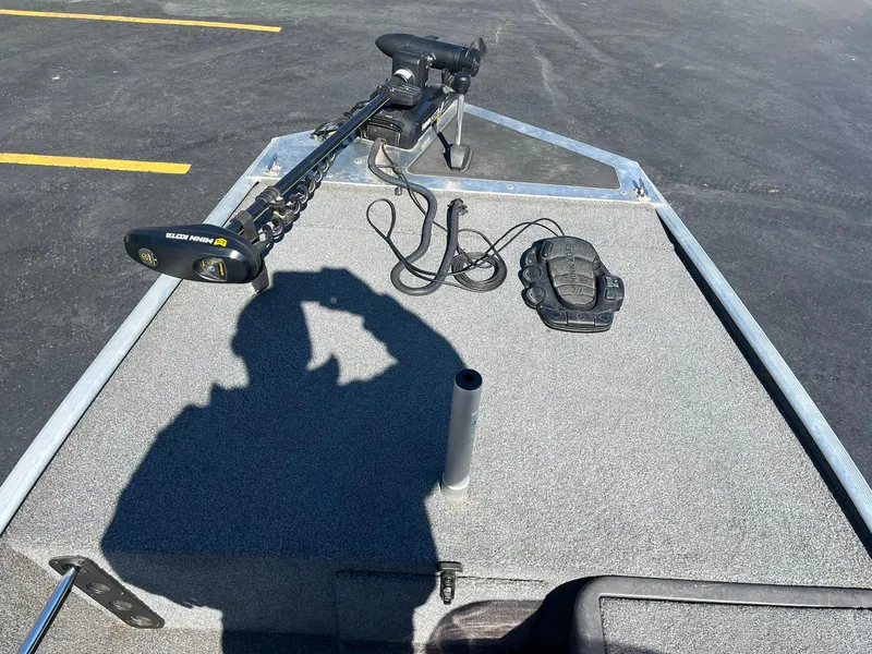 Slide: The Image of 2020 Tracker Bass Tracker Classic XL boat deck with trolling motor and shadow. - 21