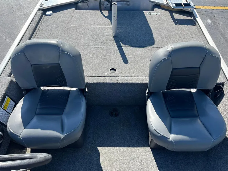 Slide: The Image of 2020 Tracker Bass Tracker Classic XL boat seats, gray upholstery, front deck view. - 23