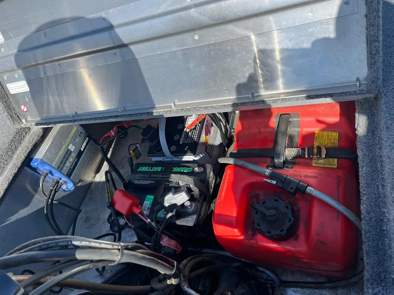 Slide: The Image of 2020 Tracker Bass Tracker Classic XL boat battery and fuel tank compartment. - 26