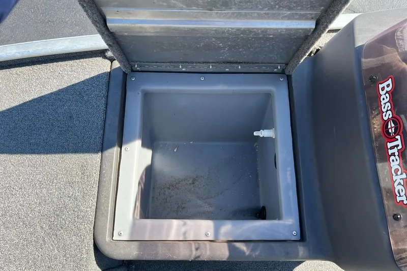 Slide: The Image of 2020 Tracker Bass Tracker Classic XL livewell compartment, open and empty. - 28