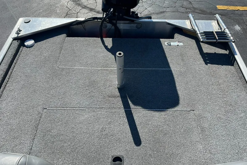 Slide: The Image of 2020 Tracker Bass Tracker Classic XL boat deck with carpeted surface and fishing seat mount. - 29