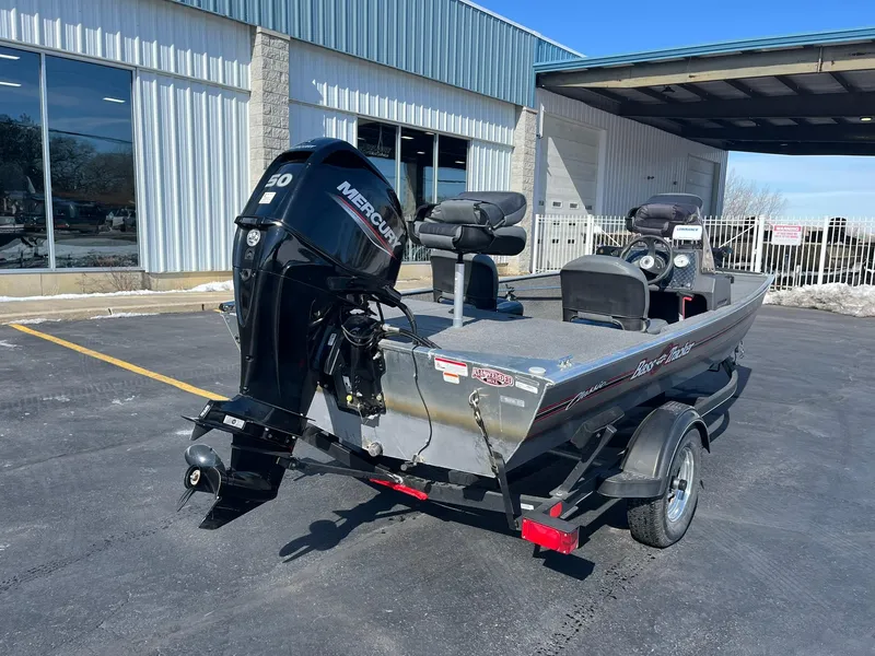 Slide: The Image of 2020 Tracker Bass Tracker Classic XL boat with Mercury engine in parking lot. - 3