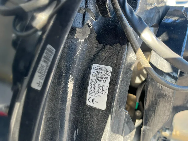 Slide: The Image of Close-up of a 2020 Tracker Bass Tracker Classic XL engine label. - 6