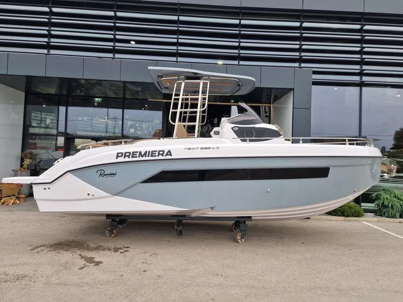 The Image of 2025 Ranieri NEXT 255 LX boat displayed outdoors. - 1