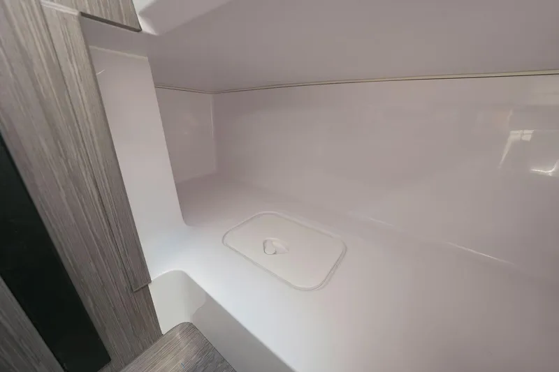 Slide: The Image of Interior cabin of 2025 Ranieri NEXT 255 LX boat, featuring sleek, modern design. - 25