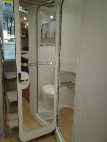 Slide: The Image of 2017 Formula 40 Performance Cruiser bathroom interior with modern amenities and sleek design. - 13