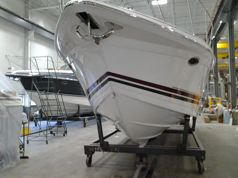 Slide: The Image of 2017 Formula 40 Performance Cruiser in a workshop, showcasing sleek design and craftsmanship. - 20