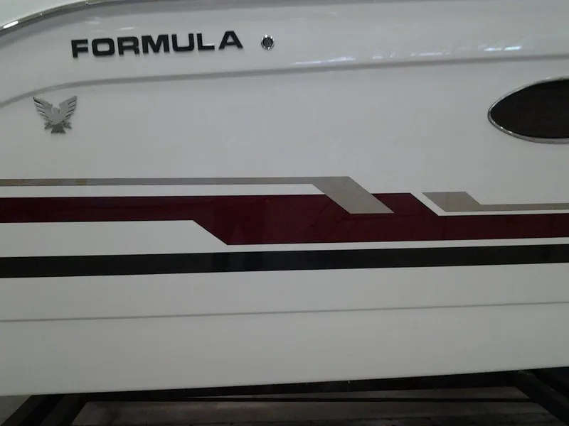 Slide: The Image of Side view of 2017 Formula 40 Performance Cruiser with sleek design and logo. - 22