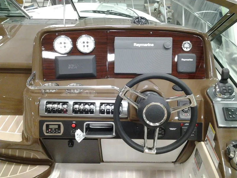 Slide: The Image of 2017 Formula 40 Performance Cruiser helm with Raymarine navigation system and control panel. - 31