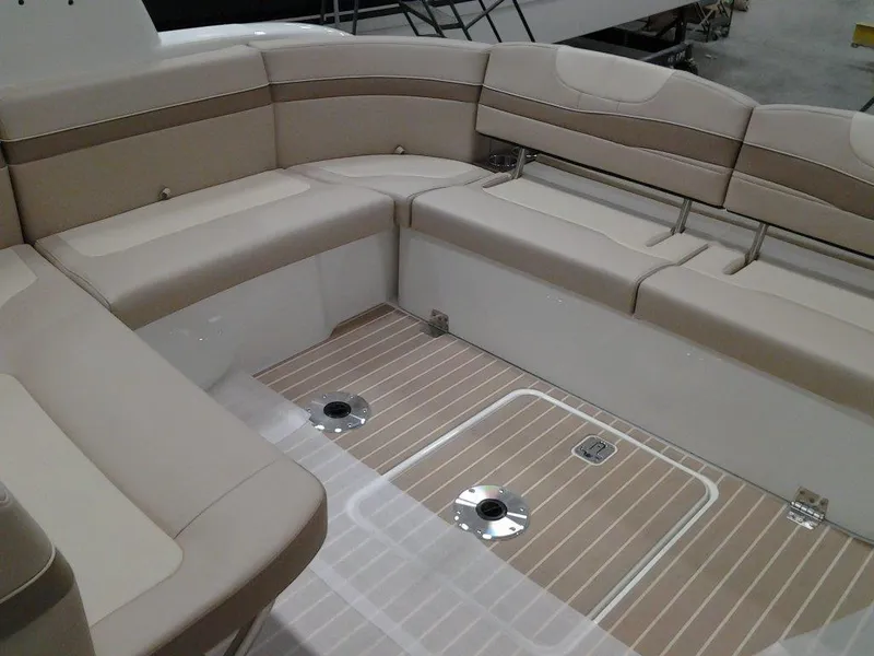 Slide: The Image of 2017 Formula 40 Performance Cruiser interior with beige seating and wood-patterned flooring. - 32