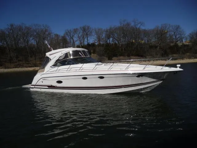 Slide: The Image of 2017 Formula 40 Performance Cruiser on calm water, side view. - 37