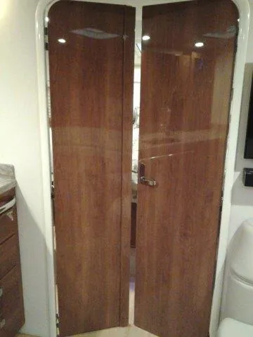 Slide: The Image of Wooden interior doors on a 2017 Formula 40 Performance Cruiser yacht. - 7